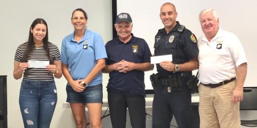  Presentation of Scholarships Left to Right Officer Melanie Lopez, Chief Tracy Frazzano, Scholarship Chair Bill Miller, Police Officer Hans Schmid and President Michael Hook.jpg