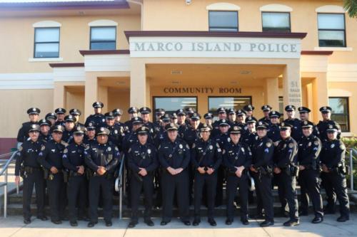 CHRISTMAS Photo of Command Staff and Officers before the Annual Marco Island Christmas Style Parade  and Gift Cards from the Police Foundation