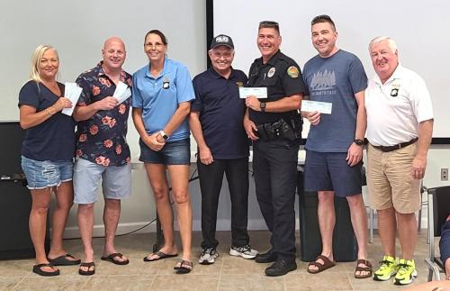 left-to-right-julie-pohutsky-lt.-matt-gallup-chief-tracy-frazzano-bill-miller-chair-police-officer-john-gray-sgt.-mark-haueter-and-president-michael-hook